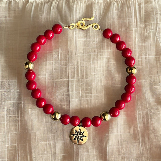 Red Bamboo Coral and Gold Bracelet with North Star Charm