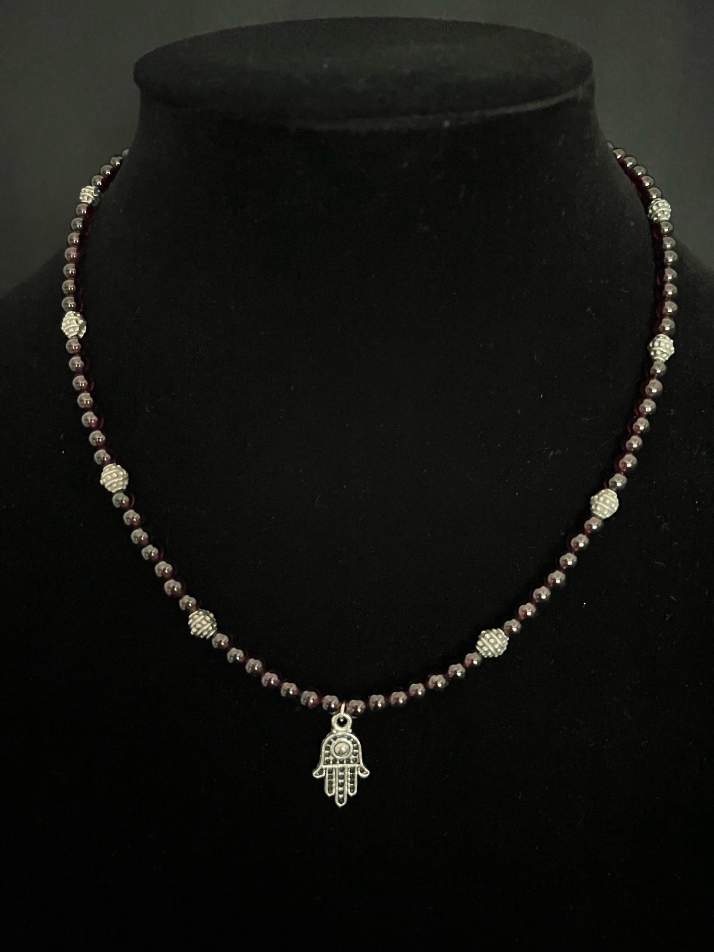 Garnet Gemstones with Silver Hamsa