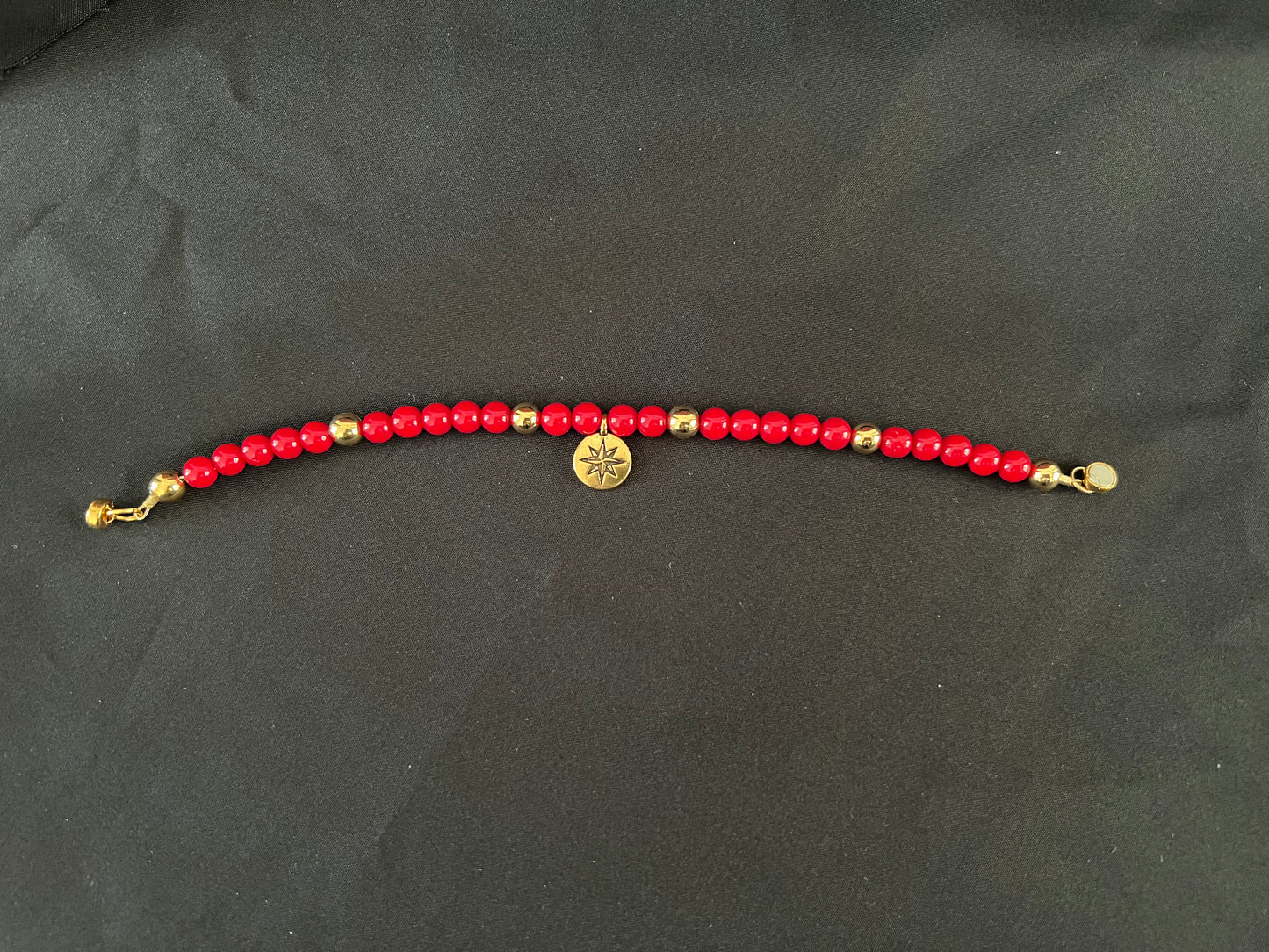 Red Bamboo Coral and Gold Bracelet with North Star Charm