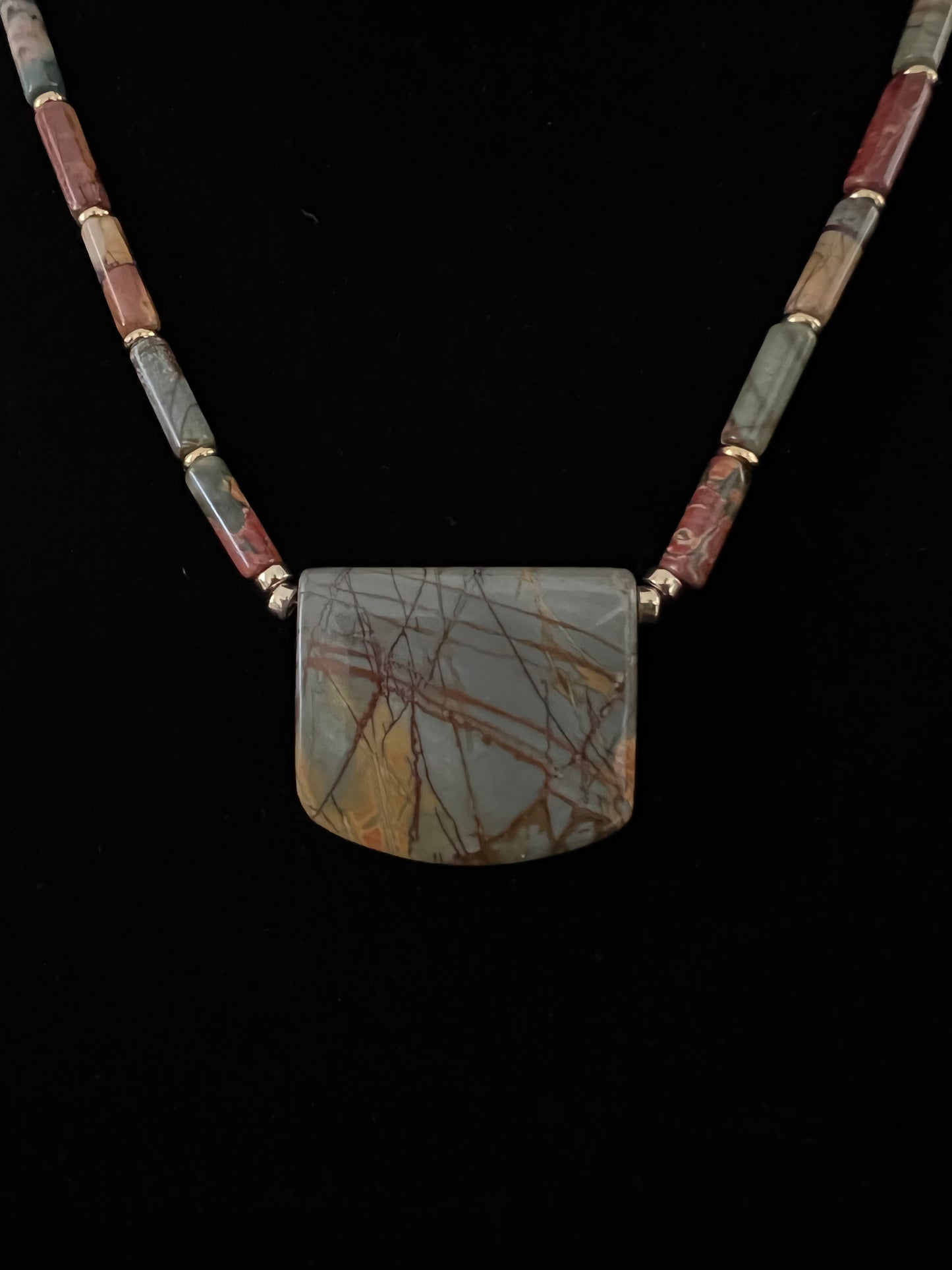 Red Creek Jasper Shield with Gold Accents